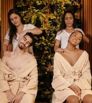 a man and a woman taking a massage